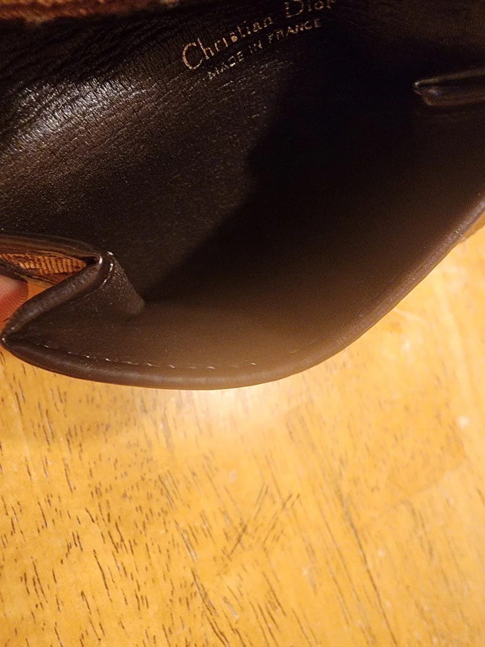 vintage Christian Dior coin purse features the iconic brown Trotter canvas mono